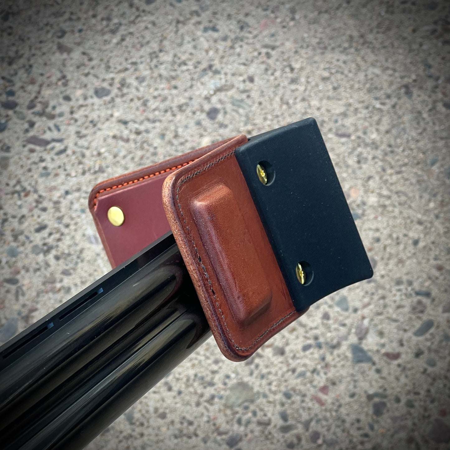 Fiberglass composite kick stand keeps the leather off the concrete and moisture.